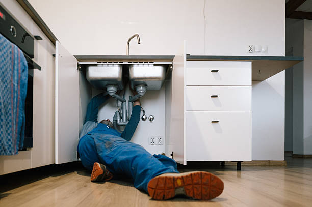 Professional Drain Cleaning technician working in Pluckemin, NJ